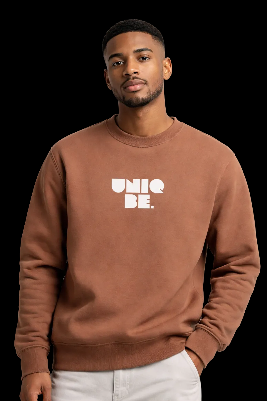 Man wearing a brown sweatshirt with 'UNIQ BE' text on a white background